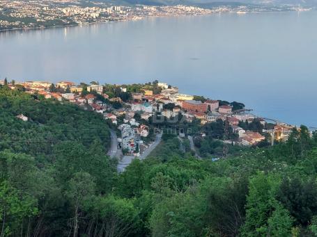 OPATIJA, KOLAVIĆI- građevinsko zemljište 1096m2 s projektom za villu i s panoramskim pogledom na mor