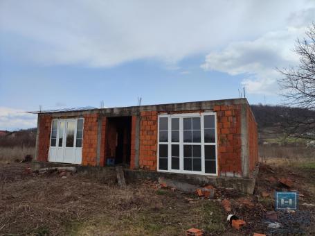 Unfinished single storey house/grey phase