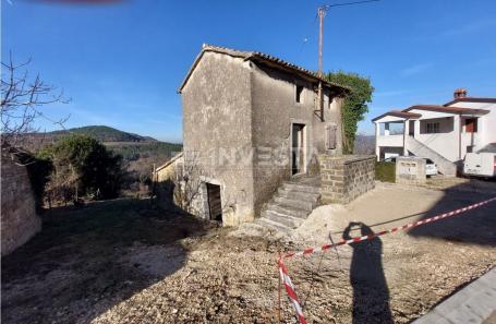 Surroundings of Motovun, autochthonous Istrian house with a view of Motovun